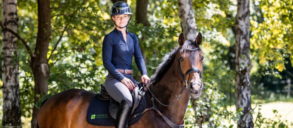 Julia Krajewski auf ihrem Olympiapferd Nickel.